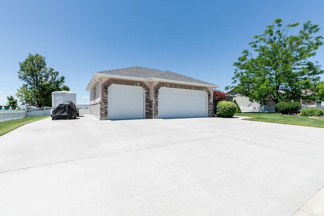 831 S 1150 E, Preston, ID 83263 - view of front facade with driveway and an attached garage