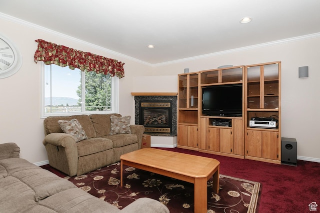 831 S 1150 E, Preston, ID 83263 - living room featuring crown molding, a glass covered fireplace, dark carpet, recessed lighting, and baseboards