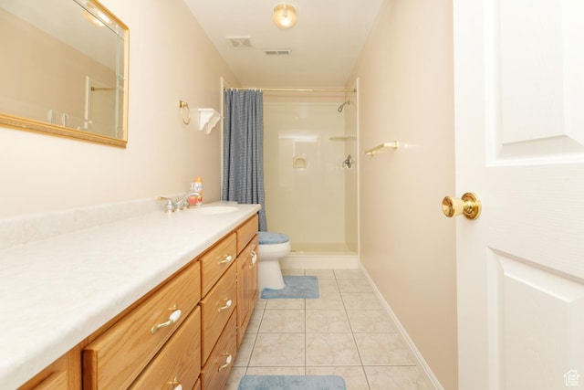 831 S 1150 E, Preston, ID 83263 - bathroom featuring vanity, a shower with shower curtain, tile patterned floors, toilet, and baseboards
