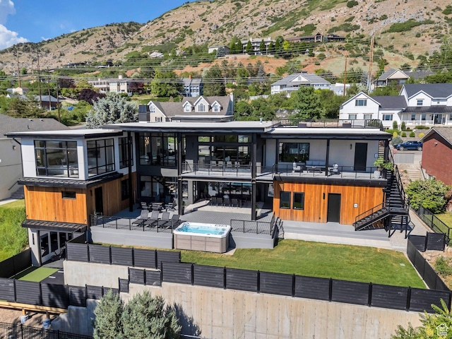 3943 N Foothill Dr, Provo, UT 84604 - rear view of property featuring stairs, a fenced backyard, a mountain view, a patio area, and a swimming pool