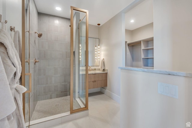 3943 N Foothill Dr, Provo, UT 84604 - full bathroom with tiled shower, vanity, baseboards, tile patterned flooring, and recessed lighting