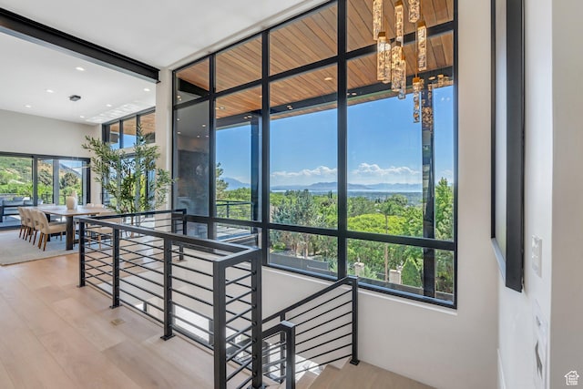 3943 N Foothill Dr, Provo, UT 84604 - stairs featuring plenty of natural light, a chandelier, wood finished floors, and recessed lighting