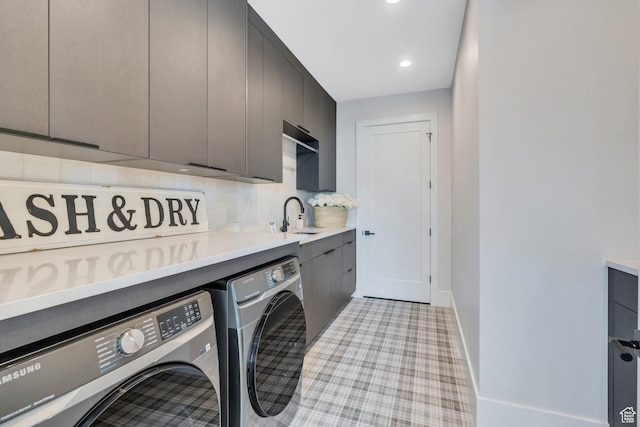 3943 N Foothill Dr, Provo, UT 84604 - laundry area with washing machine and clothes dryer, cabinet space, baseboards, and recessed lighting