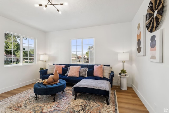 155 W 800 N, Spanish Fork, UT 84660 - living room featuring a chandelier, light wood-style floors, and baseboards
