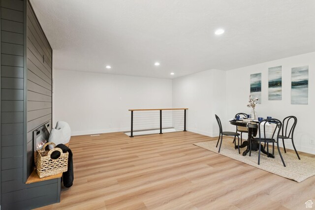 155 W 800 N, Spanish Fork, UT 84660 - dining room with light wood-style flooring, baseboards, recessed lighting, and a large fireplace