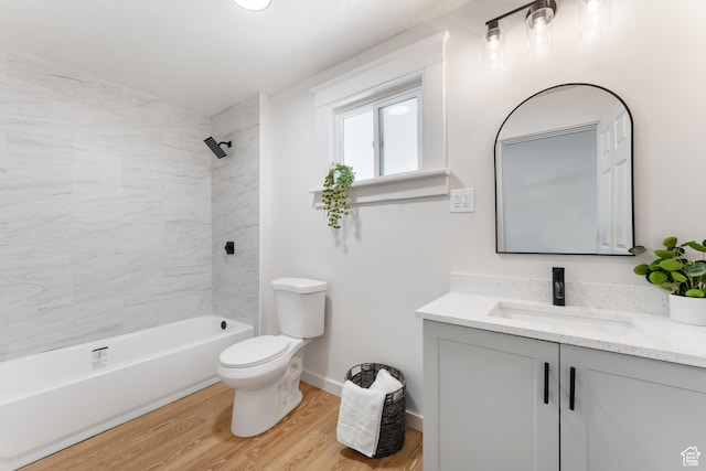 2802 W 5600 S, Roy, UT 84067 - full bathroom featuring vanity, toilet, wood finished floors, shower / bathtub combination, and baseboards