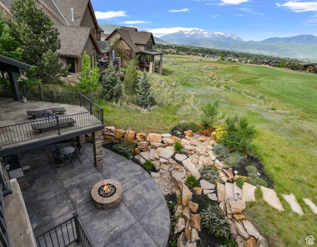 707 N Chimney Rock Rd, Heber City, UT 84032 - view of patio / terrace featuring a fire pit, a mountain view, and view of golf course