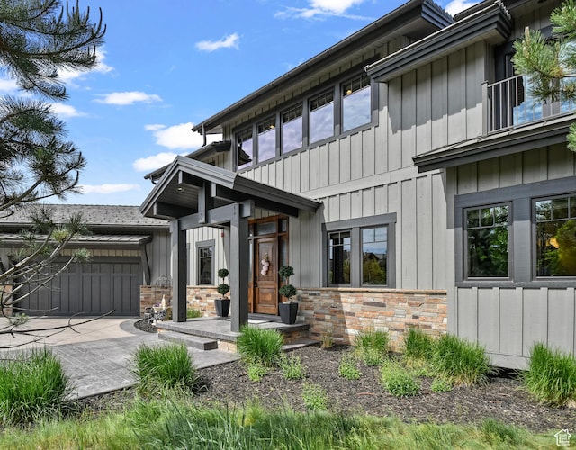 707 N Chimney Rock Rd, Heber City, UT 84032 - view of front of house with board and batten siding and stone siding