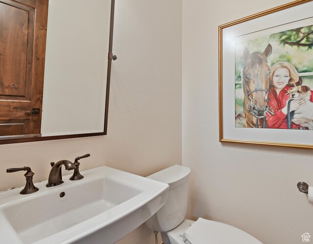 707 N Chimney Rock Rd, Heber City, UT 84032 - half bathroom with a sink and toilet