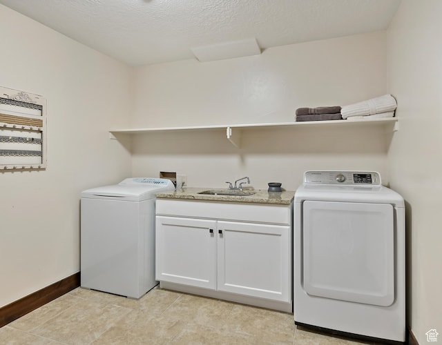 707 N Chimney Rock Rd, Heber City, UT 84032 - washroom featuring cabinet space, baseboards, separate washer and dryer, and a textured ceiling