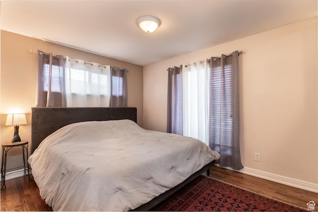 1820 E Meadow Dr S, Cottonwood Heights, UT 84121 - bedroom featuring dark wood-style flooring and baseboards