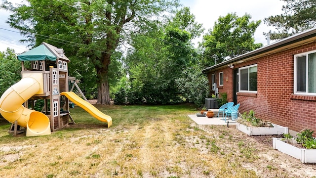 1820 E Meadow Dr S, Cottonwood Heights, UT 84121 - view of grassy yard with a playground and a vegetable garden