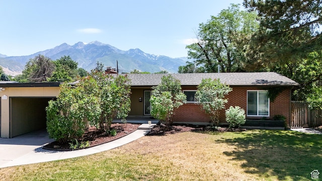 1820 E Meadow Dr S, Cottonwood Heights, UT 84121 - single story home with driveway, a garage, a mountain view, and brick siding