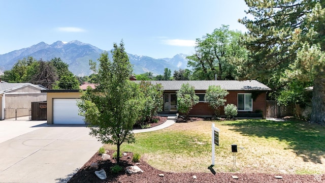 1820 E Meadow Dr S, Cottonwood Heights, UT 84121 - ranch-style house featuring driveway, a garage, a mountain view, and brick siding