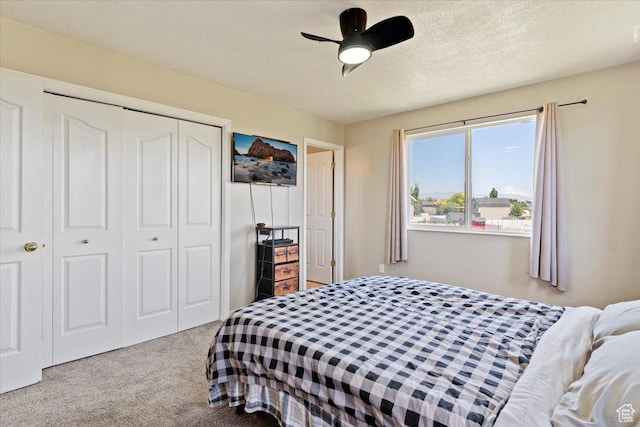 2373 S 2830 W, Syracuse, UT 84075 - bedroom featuring carpet flooring, a closet, a ceiling fan, and a textured ceiling