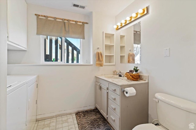 2373 S 2830 W, Syracuse, UT 84075 - full bath with independent washer and dryer, vanity, tile patterned floors, and toilet