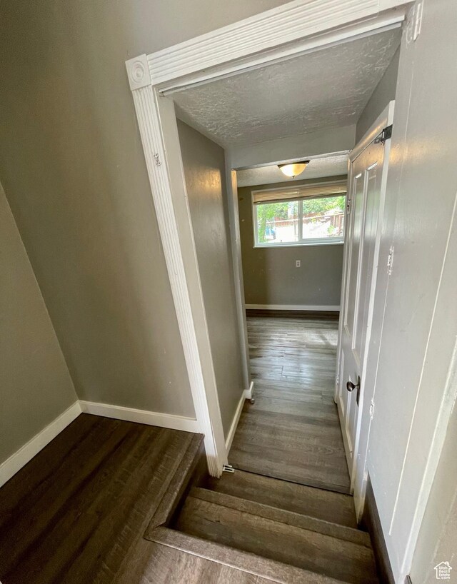 947 W 1300 N, Carbonville, UT 84501 - stairway with wood finished floors, baseboards, and a textured ceiling