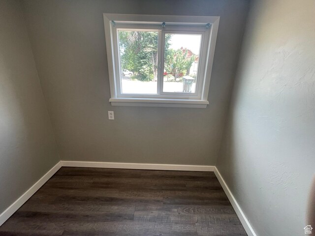 947 W 1300 N, Carbonville, UT 84501 - empty room with dark wood-style flooring and baseboards