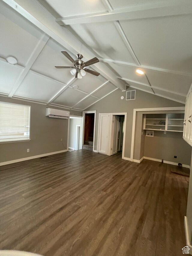 947 W 1300 N, Carbonville, UT 84501 - unfurnished living room featuring a wall mounted air conditioner, ceiling fan, dark wood-style flooring, and baseboards