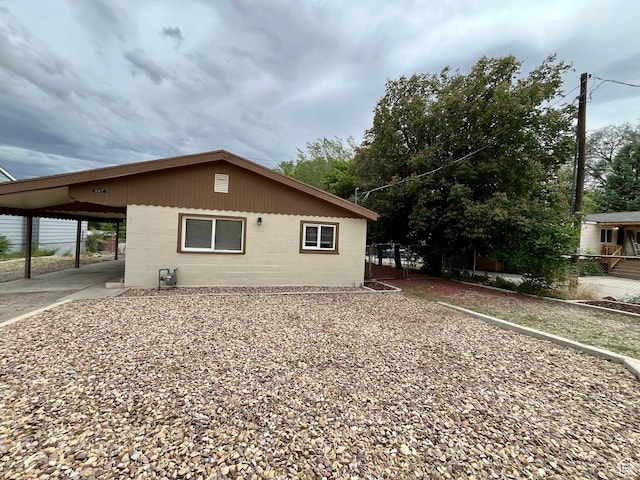 947 W 1300 N, Carbonville, UT 84501 - view of side of property with concrete block siding and an attached carport