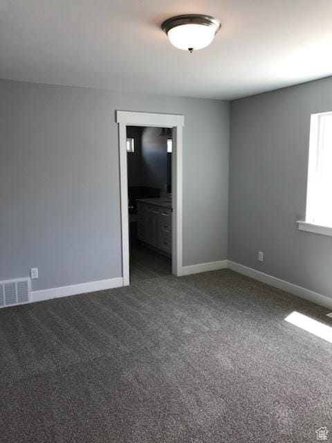 1515 N 250 E, Nephi, UT 84648 - spare room featuring dark carpet and baseboards