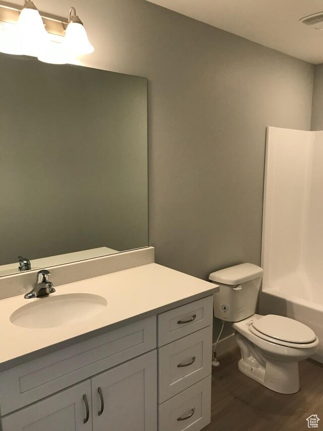 1515 N 250 E, Nephi, UT 84648 - bathroom featuring toilet, vanity, and wood finished floors