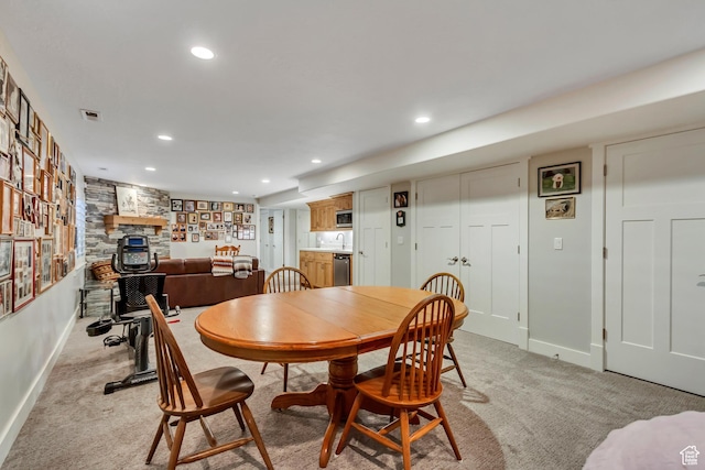 849 N 400 E, Springville, UT 84663 - dining room with baseboards, a fireplace, light carpet, and recessed lighting