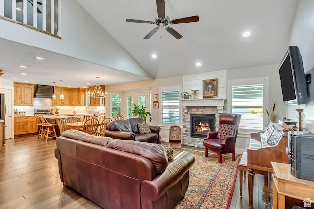 849 N 400 E, Springville, UT 84663 - living area with a ceiling fan, a fireplace, recessed lighting, wood finished floors, and high vaulted ceiling