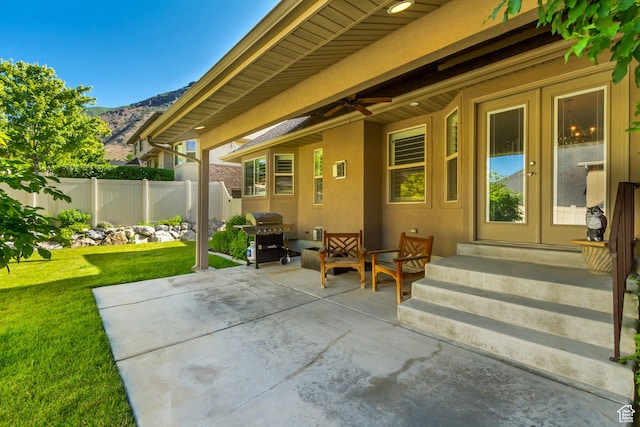 849 N 400 E, Springville, UT 84663 - view of patio / terrace with grilling area, a mountain view, french doors, and entry steps
