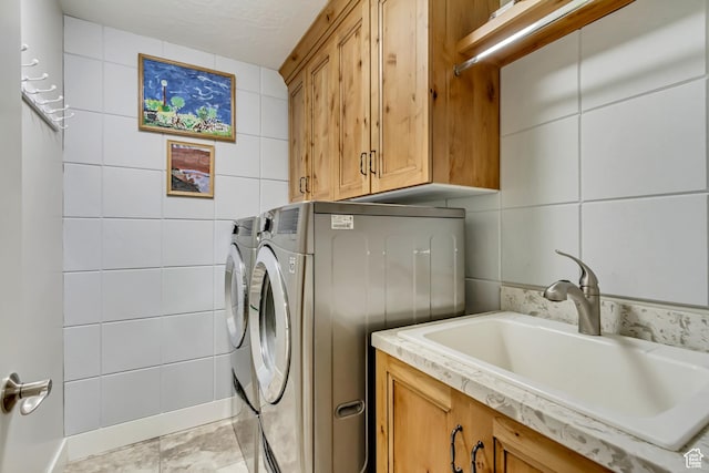 849 N 400 E, Springville, UT 84663 - washroom with cabinet space, tile walls, and washer and dryer
