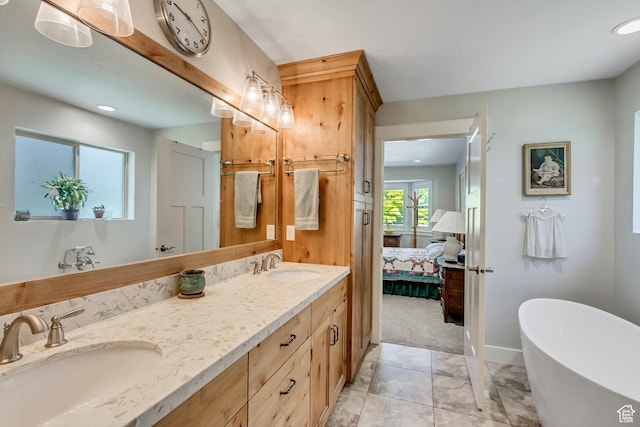 849 N 400 E, Springville, UT 84663 - full bath with ensuite bathroom, double vanity, a freestanding tub, recessed lighting, and baseboards