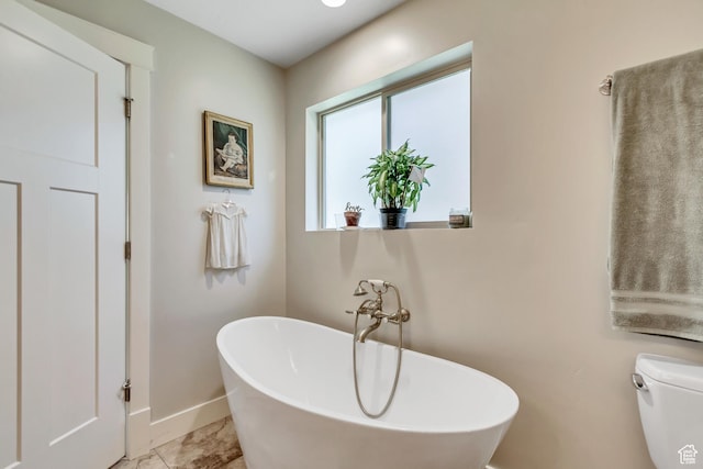 849 N 400 E, Springville, UT 84663 - full bathroom with a freestanding bath, baseboards, and toilet