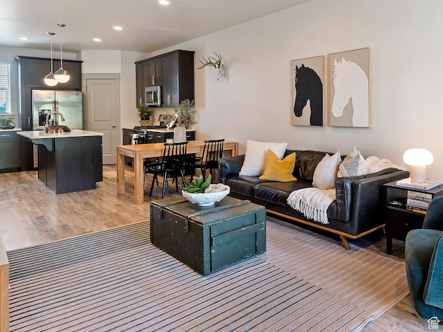 1940 S 200 W Unit 11, Bountiful, UT 84010 - living room with light wood finished floors and recessed lighting