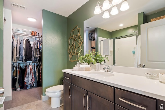1940 S 200 W Unit 11, Bountiful, UT 84010 - full bath with vanity, a spacious closet, a shower with door, and tile patterned floors