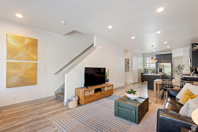 1940 S 200 W Unit 11, Bountiful, UT 84010 - living area featuring stairs, light wood-style flooring, and recessed lighting