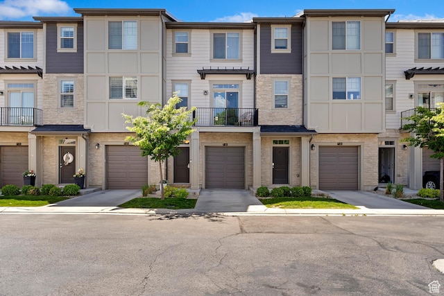 1940 S 200 W Unit 11, Bountiful, UT 84010 - view of front facade featuring driveway and an attached garage