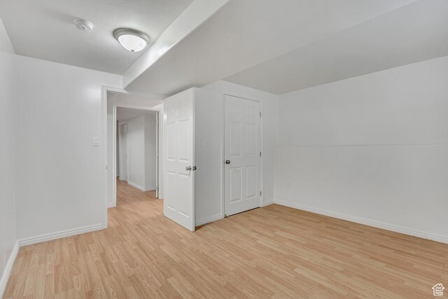 4564 S Early Duke St, West Valley City, UT 84120 - additional living space featuring light wood finished floors and baseboards