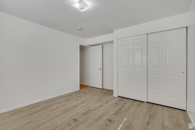 4564 S Early Duke St, West Valley City, UT 84120 - unfurnished bedroom with light wood-style floors and baseboards