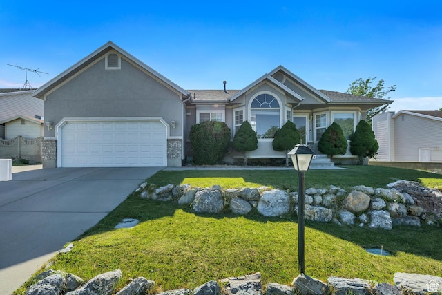 4564 S Early Duke St, West Valley City, UT 84120 - single story home featuring an attached garage, driveway, a front yard, and stucco siding