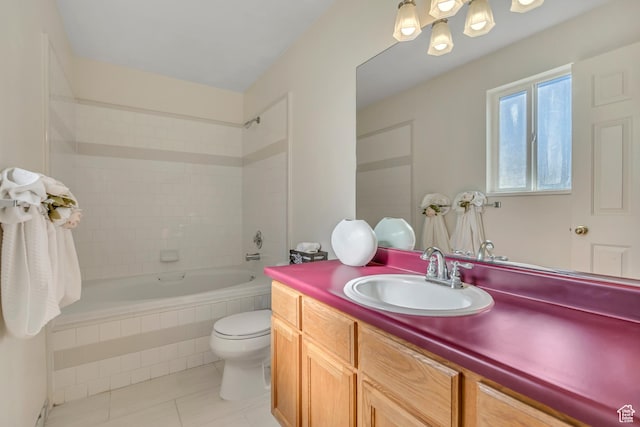 4564 S Early Duke St, West Valley City, UT 84120 - full bathroom with tile patterned floors, toilet, vanity, and tiled shower / bath combo