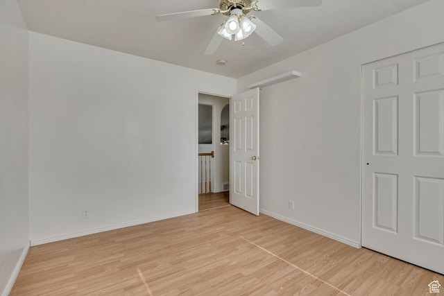 4564 S Early Duke St, West Valley City, UT 84120 - unfurnished bedroom with light wood-style flooring, baseboards, and a ceiling fan