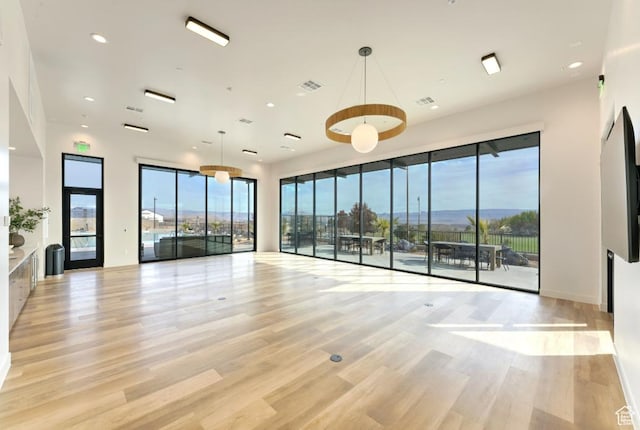 1367 N Daylight St Unit 16, Washington, UT 84780 - empty room with light wood-type flooring, plenty of natural light, and recessed lighting
