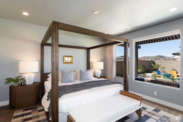 1367 N Daylight St Unit 16, Washington, UT 84780 - bedroom featuring baseboards, recessed lighting, wood finished floors, and a textured ceiling