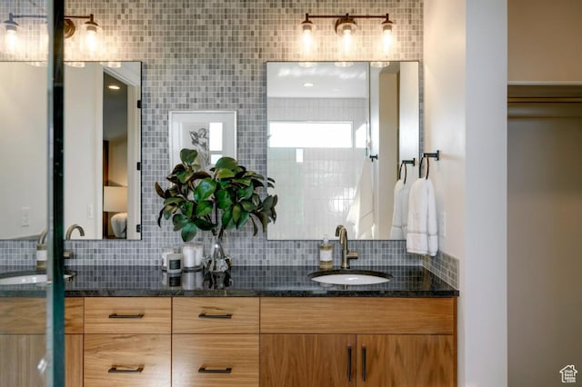 1367 N Daylight St Unit 16, Washington, UT 84780 - bathroom with double vanity and decorative backsplash