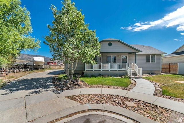 2172 White Pine Rd, Eagle Mountain, UT 84005 - bungalow-style house with a porch and driveway