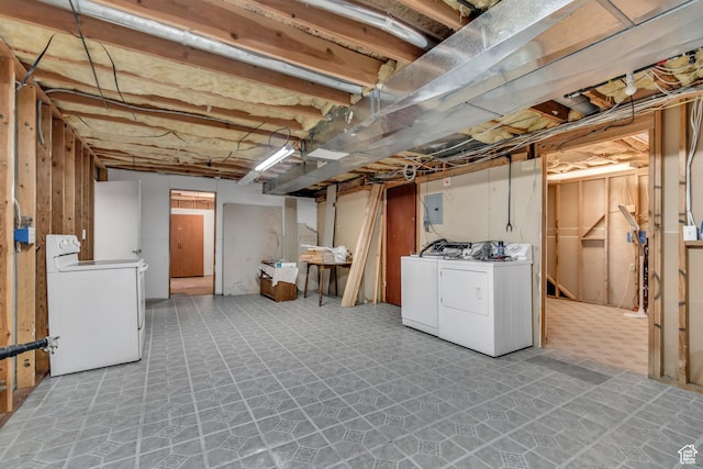 2172 White Pine Rd, Eagle Mountain, UT 84005 - unfinished below grade area with independent washer and dryer, electric panel, and tile patterned floors