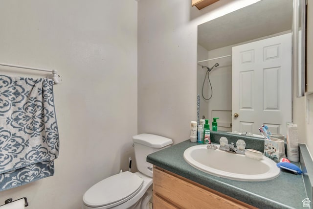 2172 White Pine Rd, Eagle Mountain, UT 84005 - bathroom featuring toilet, vanity, and a shower