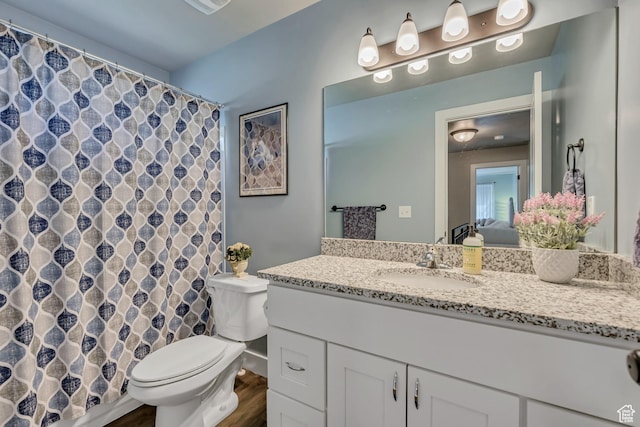 453 N Cattail Dr E, Ogden, UT 84404 - full bathroom with toilet, vanity, wood finished floors, and a shower with curtain