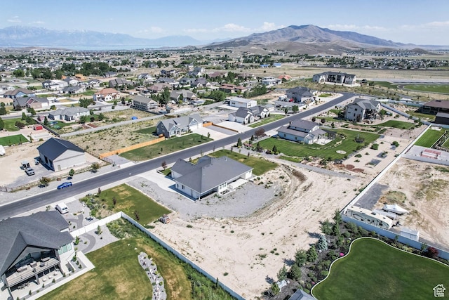 9447 N Arrowhead Dr, Eagle Mountain, UT 84005 - aerial view of residential area with a mountainous background