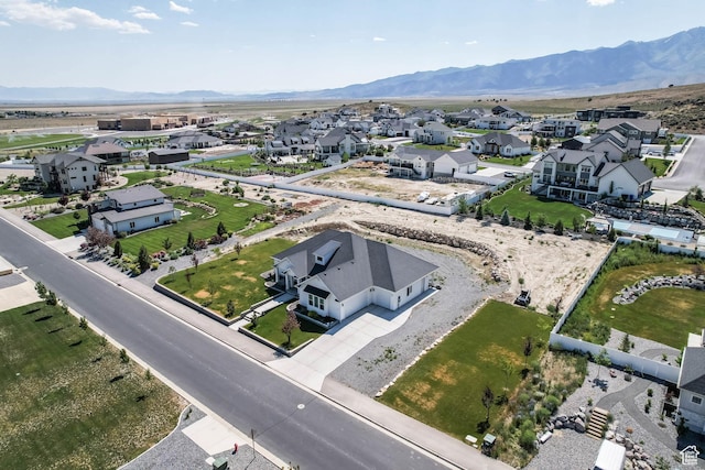 9447 N Arrowhead Dr, Eagle Mountain, UT 84005 - aerial view of residential area featuring a mountainous background